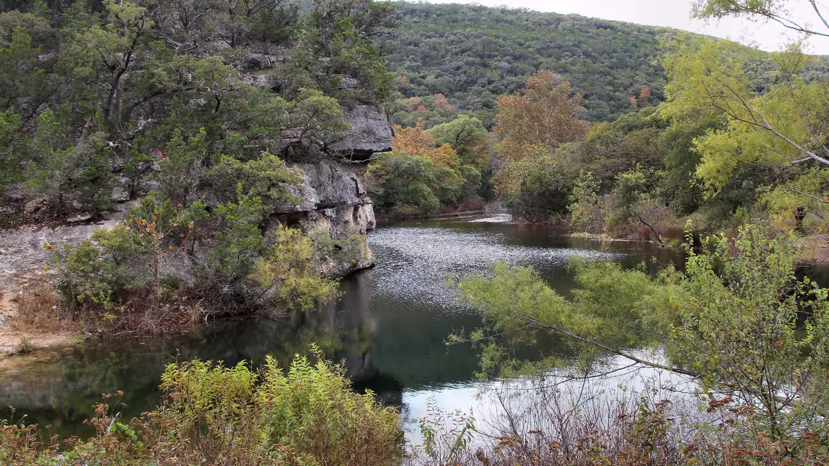 Can Creek running through a wooded canyon at Lost Maples State Natural Area, with bigtooth maples along the banks